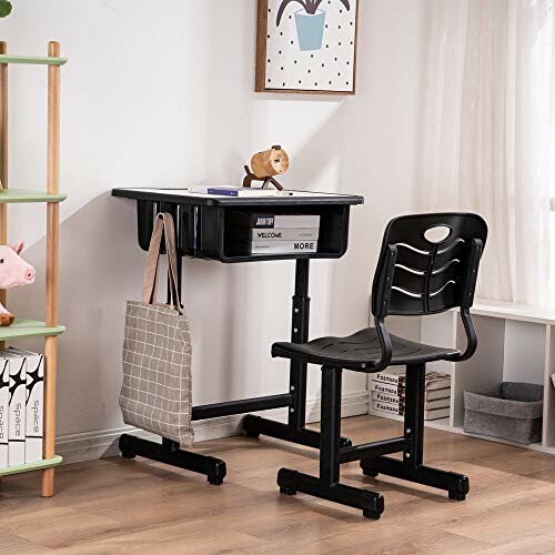 Children's study desk and chair set in a room.