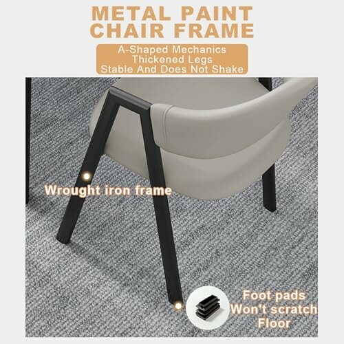 Chair with metal paint frame and foot pads on carpet.