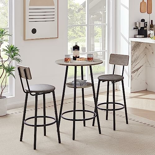 Modern kitchen bar set with stools and round table.