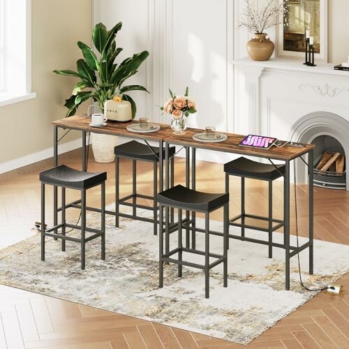 Contemporary kitchen bar table with stools and decor.