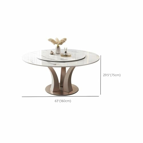 Modern round dining table with decorative items, dimensions shown.