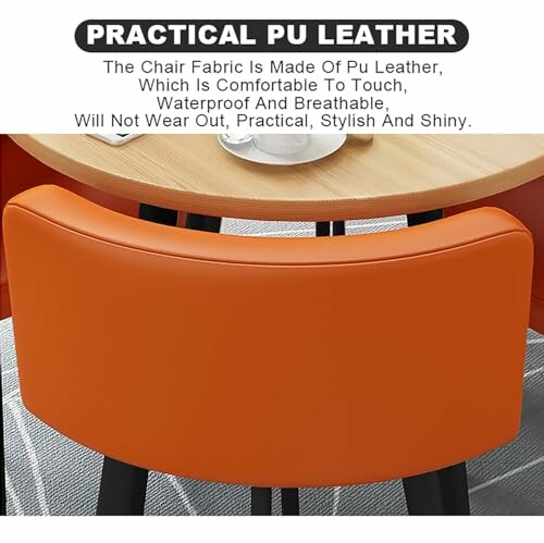 Orange PU leather chair with wooden table. 