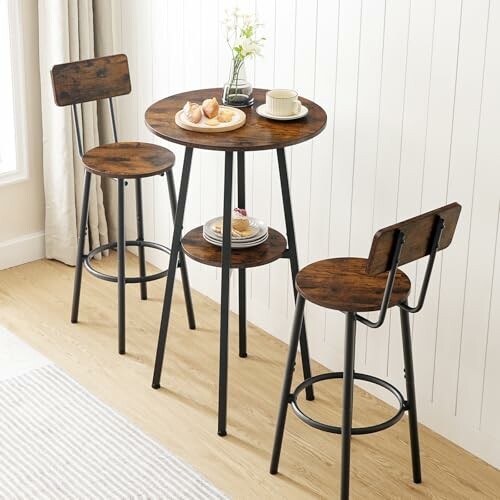 Rustic bar table set with two stools and breakfast items.