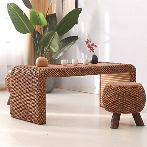 Stylish woven table and stool set with plants and tea set